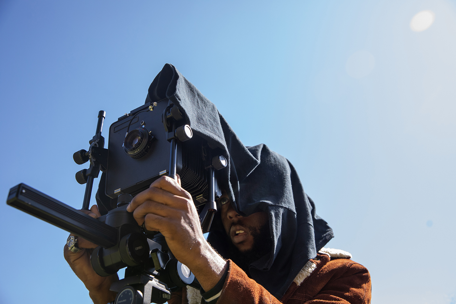 student uses old fashioned camera
