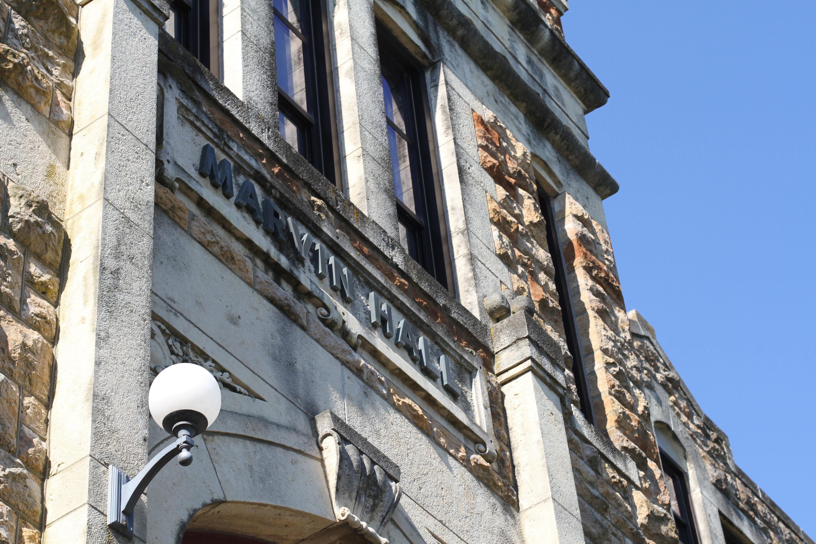 color photograph showing detail of exterior facade above Marvin Hall entrance.